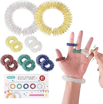 A close-up of a silver spinner ring on a finger and a beaded sensory bracelet on a wrist