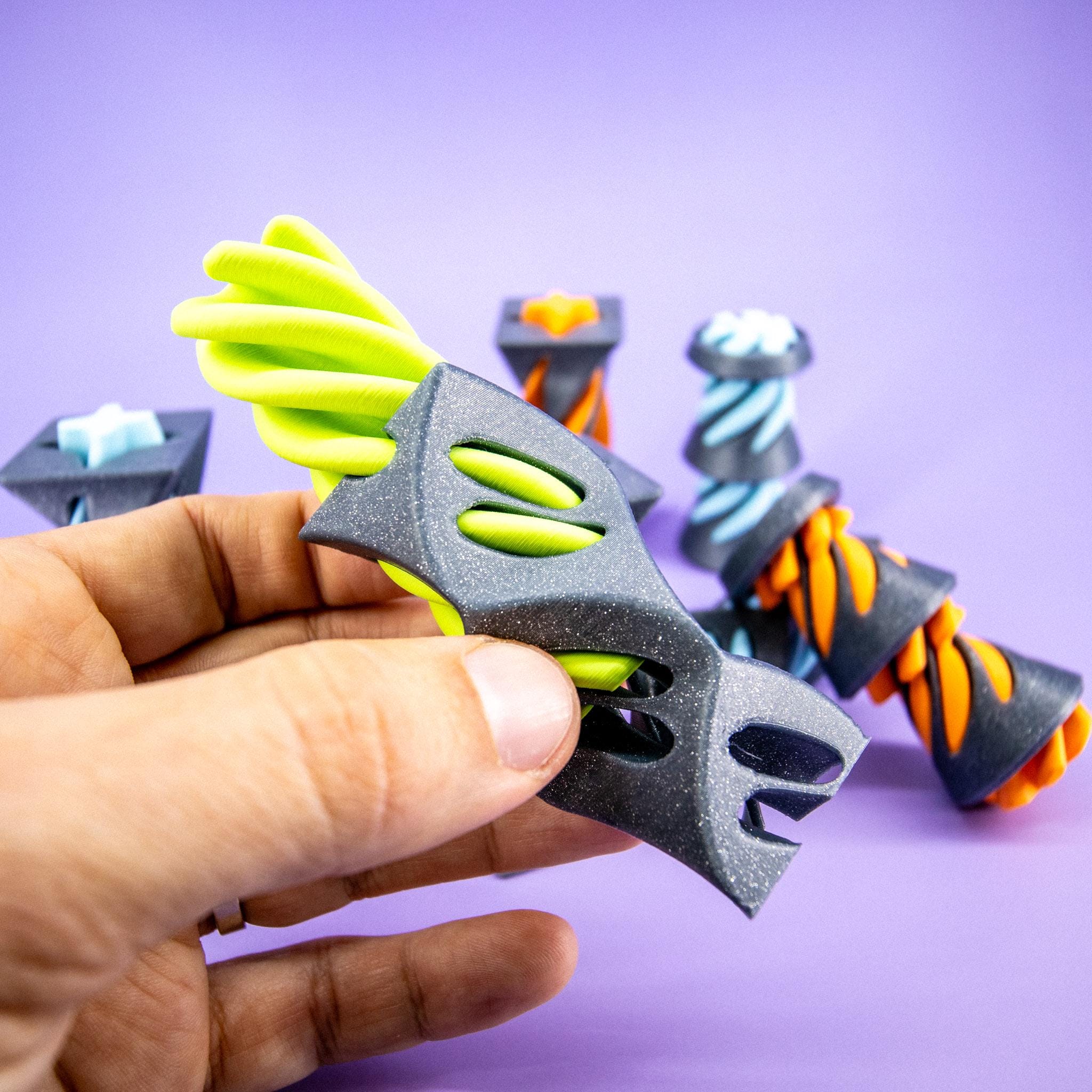 A flowing helix visual fidget toy in motion, creating a mesmerizing pattern