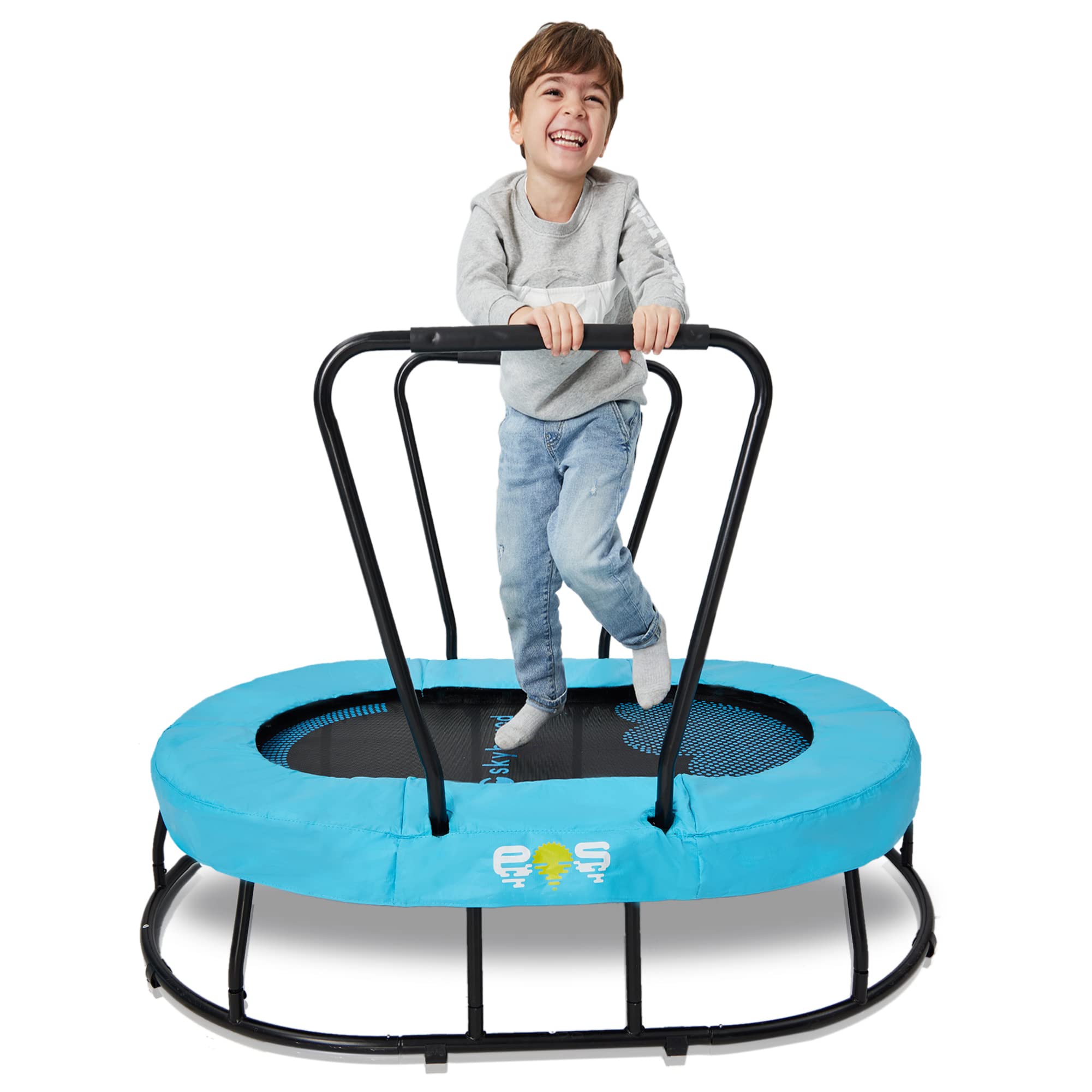 A child jumping on a small indoor trampoline