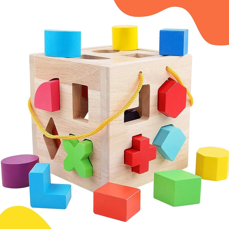 Wooden shape sorter cube with geometric blocks