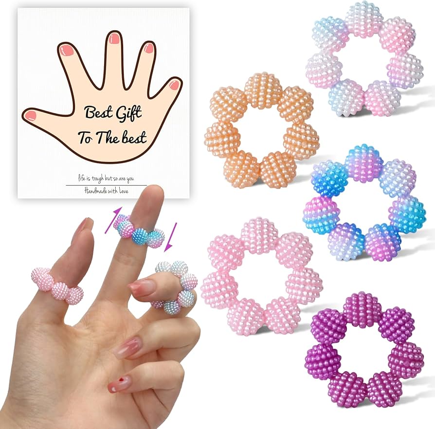 Ring with movable beads for subtle tactile stimulation