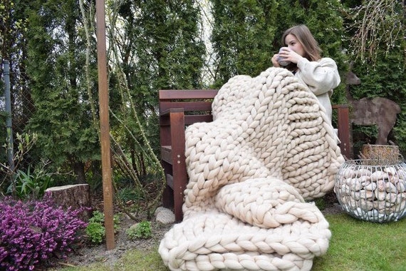 Adult using weighted blanket for anxiety relief
