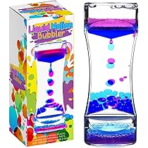 A child watching a colorful liquid motion bubbler