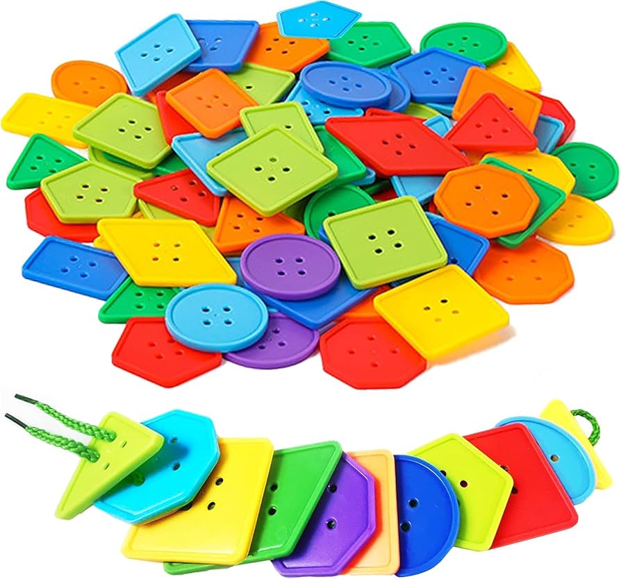 Fine motor toys like a shape sorter and threading beads