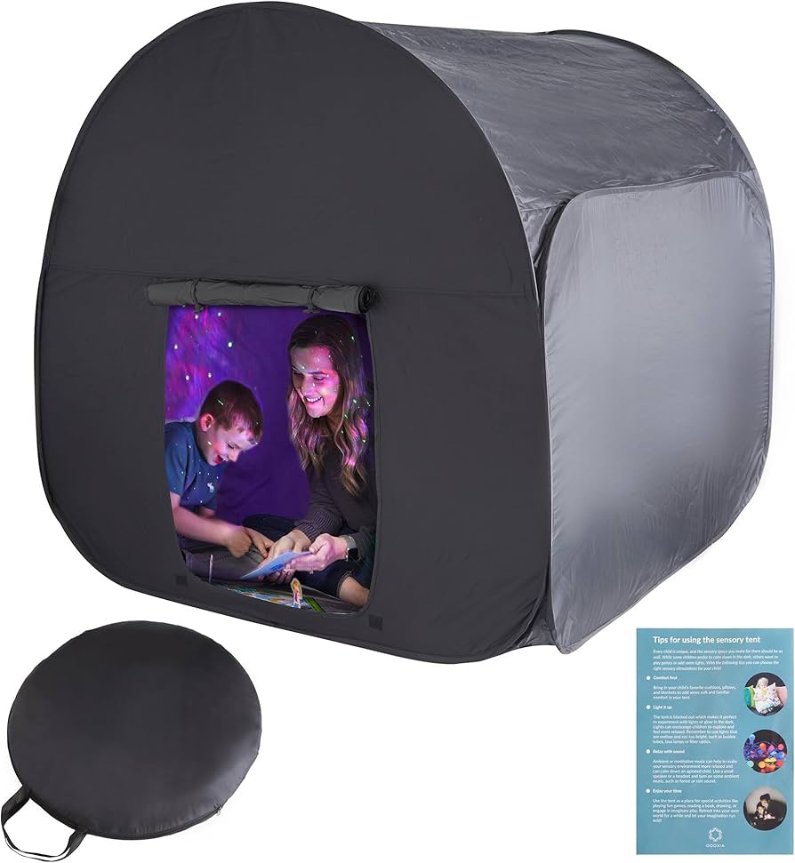 A colorful pop-up sensory tent filled with soft pillows and blankets, creating a cozy retreat