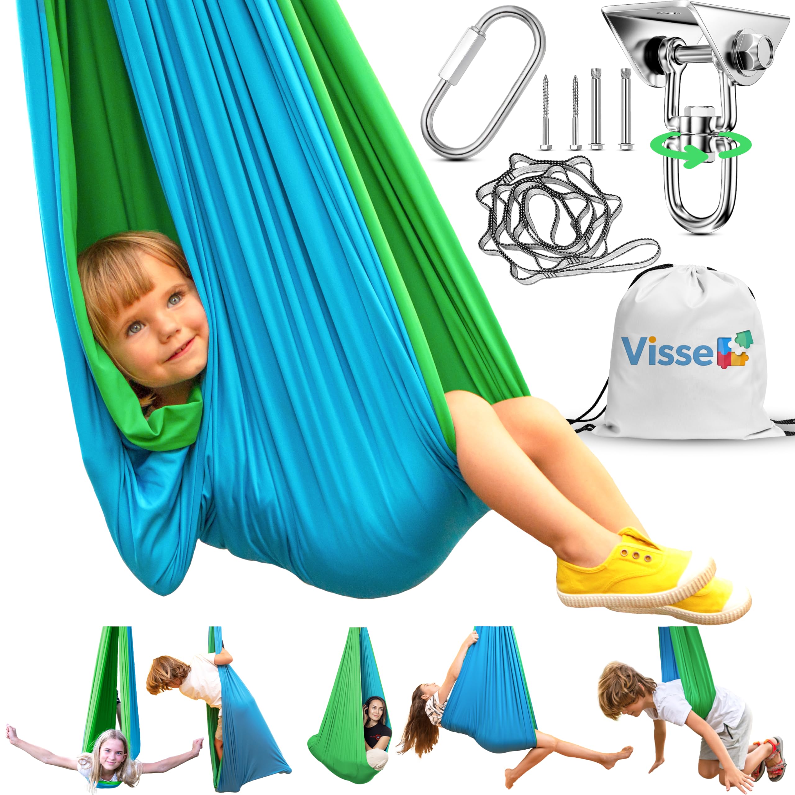 A toddler smiling in a cocoon-style sensory swing