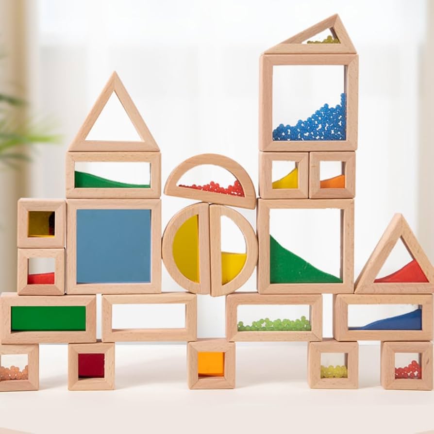 Toddler stacking colorful wooden blocks