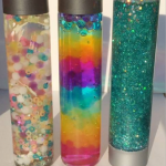 DIY sensory bottles with glitter, beads, and colored water