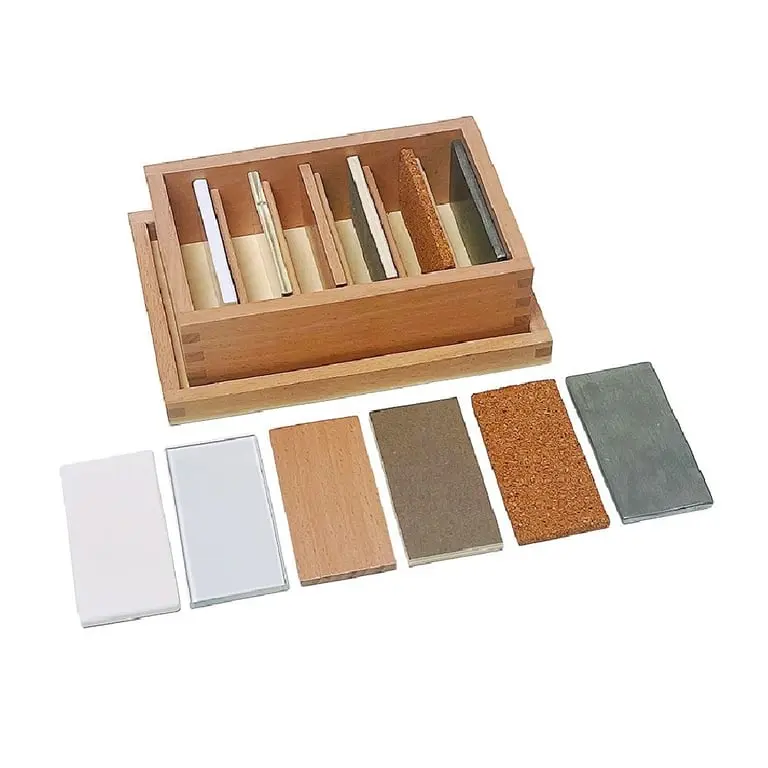 Close-up of Montessori tactile boards with different textured surfaces