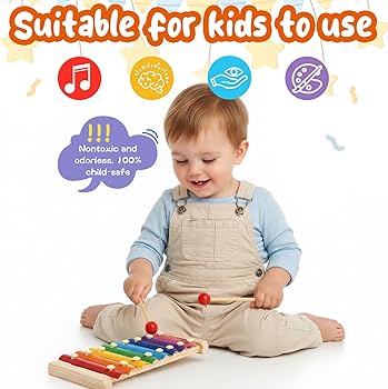 Toddler playing a wooden xylophone with mallets