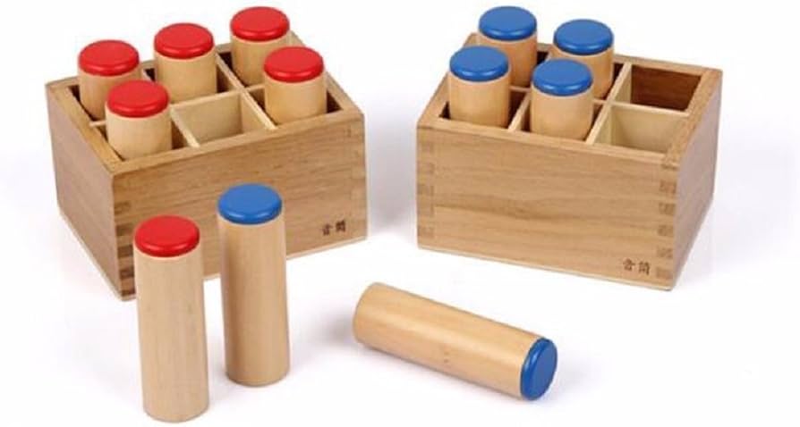 Set of Montessori sound cylinders in a wooden box